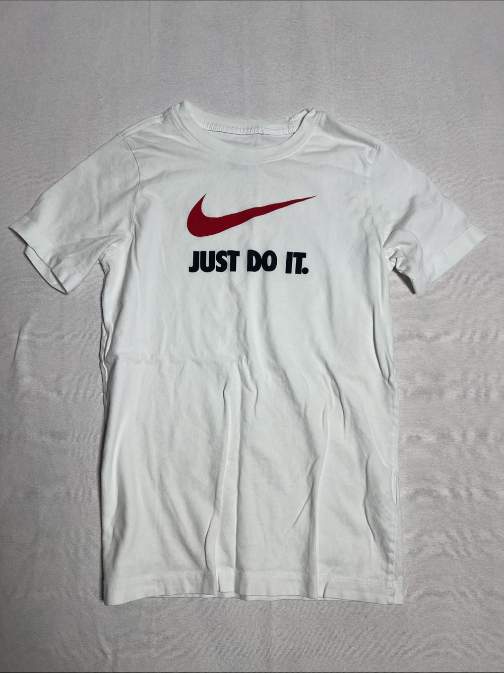 Nike White Tee with Red Swoosh and Black Text